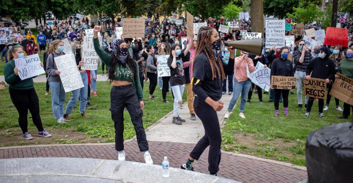 Shaela Abbott-McLeod (front left) and Alicia Abbott-McLeod (front right) pictured at the Black Lives Matter march in Peterborough in June 2020. The sisters are both activists, members of the Black Lives Matter Nogojiwanong board, and hosts of the "Black Girls Chatter" podcast produced in collaboration with Black Lives Matter Nogojiwanong and Arthur, Trent University's student-run newspaper. (Photo courtesy of Black Lives Matter Nogojiwanong)