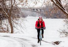 Peterborough is home to many year-round cyclists. For some it is a way to get outside, for others a main mode of travel. Here, Peterborough resident Carol Love rides her bike along the Millennium Trail. (Photo: Vicky Paradisis)