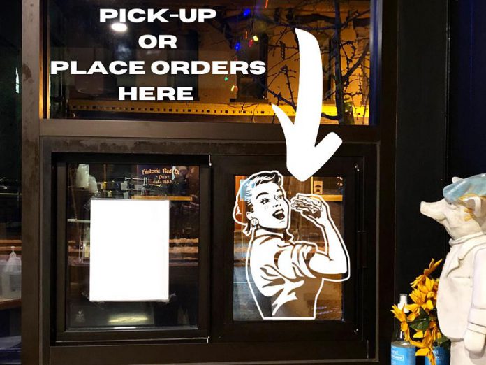 Sam's Place's repurposed its takeout window, originally installed before the pandemic to serve customers after 10 p.m., to become a safe, contactless was to serve customers during the pandemic. (Photo courtesy of Sam's Place) 