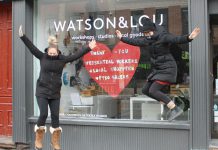 Watson & Lou co-owners Erin Watson and Anna Eidt literally jump for joy after recently reopening the doors of their downtown Peterborough shop to in-person shoppers. Their creative hub, which helps local artists and makers reach a wider audience year-round, continues to also offer online shopping, curbside pickup, and free local delivery. (Photo courtesy of Watson & Lou)