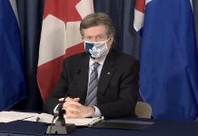 Toronto mayor John Tory listening to a reporter's question during a media briefing on February 8, 2021, when Toronto Public Health reported Canada's first known case of the Brazilian variant of COVID-19. (CPAC screenshot)