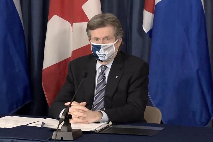 Toronto mayor John Tory listening to a reporter's question during a media briefing on February 8, 2021, when Toronto Public Health reported Canada's first known case of the Brazilian variant of COVID-19. (CPAC screenshot)