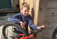 Kye is getting his bike ready for spring, making sure his chain is well oiled and free of damage. Once it's ready, he'll plan his cycling route with his family. Together, they'll make sure it is fun and free of hazards. (Photo: Jackie Donaldson)