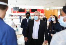 Ontario Premier Doug Ford touring a mass vaccination site at the Centennial College Progress Campus in Scarborough on March 8, 2021. (Photo: Premier's Office)