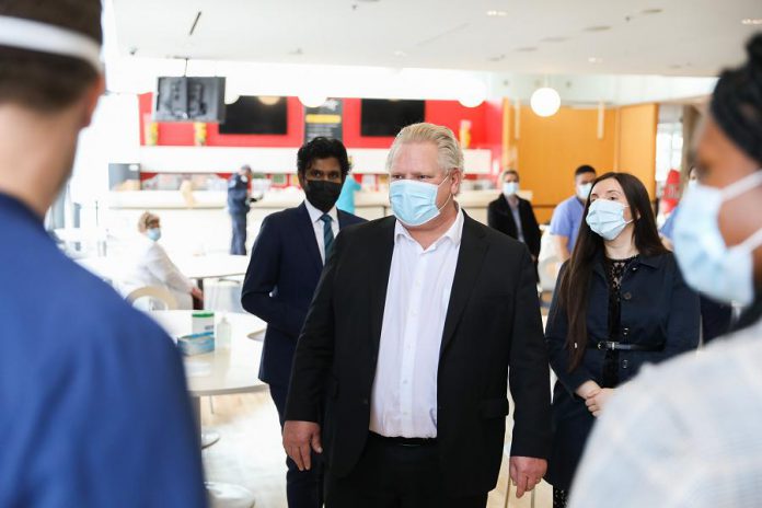 Ontario Premier Doug Ford touring a mass vaccination site at the Centennial College Progress Campus in Scarborough on March 8, 2021. (Photo: Premier's Office)
