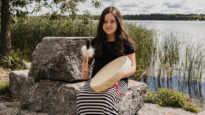 Not long after launching "Inspire: The Women's Portrait Project", Peterborough photographer Heather Doughty started a parallel project called "Day of the Girl", featuring young women like 11-year-old Ammielia Garbutt of the  Curve Lake First Nation Girl's Drumming Group.  (Photo: Heather Doughty)