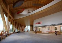 An architectural rendering of the atrium of the planned new Canadian Canoe Museum in Peterborough, showing the reception and artisan workshop areas. This northeast view has Little Lake in the background. (Illustration: Lett Architects Inc.)