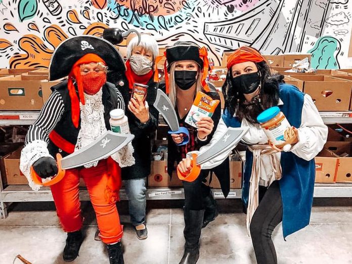 'Porch Pirates for Good' head pirate Megan Murphy (far right) and her volunteer crew Susan Dunkley (far left) and Lois Tuffin, along with Kawartha Food Share general manager Ashlee Aitken. Not pictured are all the volunteers who collected a record-breaking 50,000 pounds of food donations from businesses and residents in Peterborough on April 9 and 10, 2021. (Photo: Kawartha Food Share / Facebook)