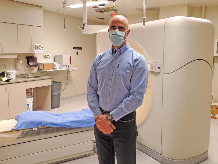 Peterborough Regional Health Centre radiologist Dr. Mario Voros calls CT scanners "the backbone" of diagnostic imaging. PRHC's current CT scanner technology (pictured with Dr. Voros) is nearing the end of its lifespan and, with help from donors, it will be replaced with new, state-of-the-art equipment to support world-class patient care. (Photo courtesy of PRHC Foundation)