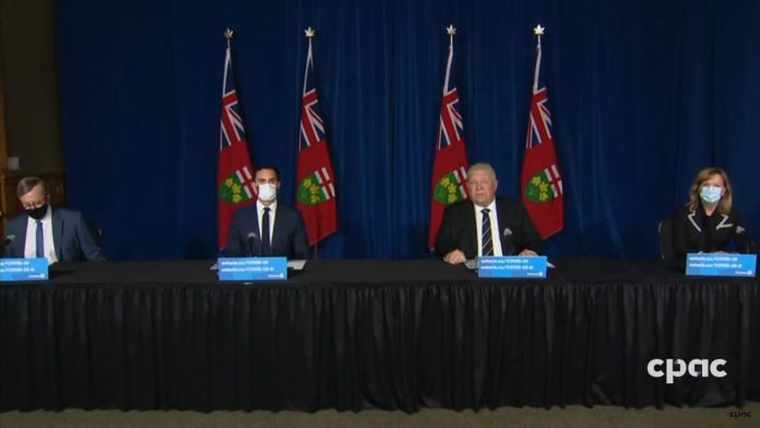 Ontario chief medical of health Dr. David Williams, education minister Stephen Lecce, Premier Doug Ford, and health minister Christine Elliott at a media conference at Queen's Park on April 12, 2021 announcing that Ontario schools will remain closed after spring break, with all elementary and secondary school students moving to remote learning as of April 19.  (CPAC screenshot)