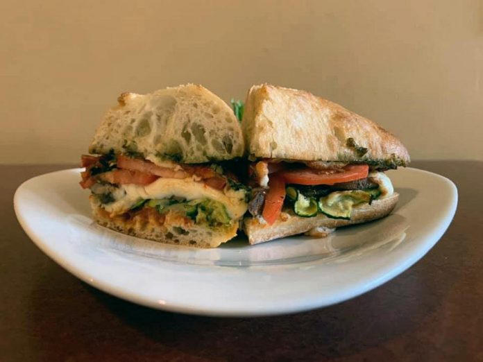 Along with sweet treats, Pastry Peddler offers healthy meals such as this vegetarian pizza sandwich. While restrictions on indoor and outdoor dining are in effect, Pastry Peddler remains open for takeout. Call 705-932-7333 to order. (Photo courtesy of Pastry Peddler)