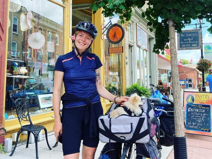 Located along a popular cycling route, Pastry Peddler is must-stop destination for local and visiting cyclists, including this young woman and her dog who arrived by bicycle from Montreal in August 2020. The restaurant is working on an outdoor patio that should be ready when dining restrictions loosen up again. (Photo courtesy of Pastry Peddler)