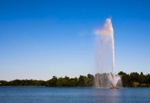 The Centennial Fountain in Peterborough's Little Lake, pictured in July 2018, will turn on for the 2021 season on May 26 and run until October 11. (Photo: City of Peterborough)