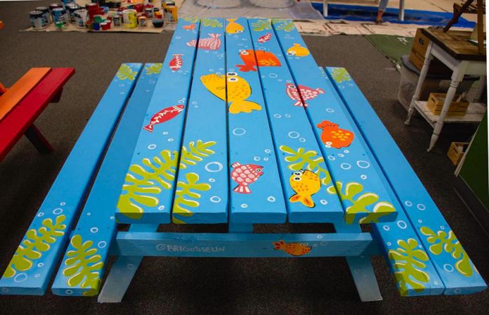 This picnic table painted by Peterborough artist Brianna Gosselin is one of 25 tables painted by 25 local artists as part of a Downtown Vibrancy Project in downtown Peterborough. The tables will be installed at various downtown businesses. (Photo: Peterborough Downtown Business Improvement Area / Facebook)