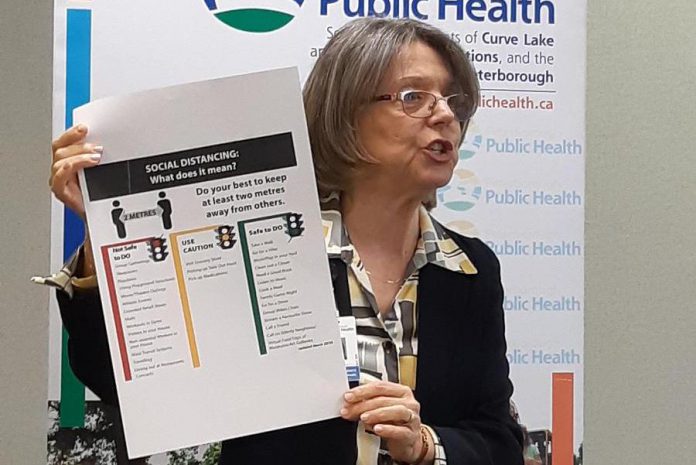 Medical officer of health Dr. Rosana Salvaterra emphasizing the importance of physical distancing during a media briefing at Peterborough Public Health on March 23, 2020, just after the pandemic was declared. (Photo: Peterborough Public Health)