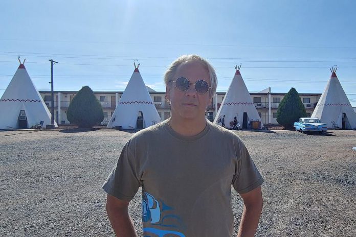 In "Going Native", host Drew Hayden Taylor examines and breaks down stereotypes of Indigenous peoples. Here he stands in front of The Wigwam Motel, a motel chain in the U.S. built during the 1930s and 1940s. As Taylor points out in an episode, the rooms are actually built in the form of teepees. (Photo courtesy of Ice River Films)