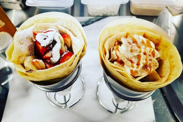 The Crepes of Wrath opened during the pandemic on Hunter Street in Peterborough. Pictured is the Classical Gas, filled with banana nutella and strawberry, and the AFP, filled with apple pie filling, graham crackers, caramel, and cinnamon. (Photo: The Crepes of Wrath)