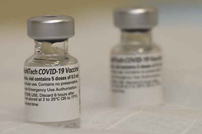 Vials of the Pfizer-BioNTech COVID-19 vaccine. (Photo: U.S. Secretary of Defense, CC BY 2.0 https://creativecommons.org/licenses/by/2.0, via Wikimedia Commons)