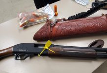 Northumberland OPP seized this shotgun and ammunition after it was allegedly displayed to another driver during a road rage incident in Hamilton Township in Northumberland County on May 30, 2021. (Police-supplied photo)