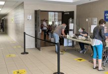 People leave the Evinrude Centre in Peterborough on May 26, 2021, after receiving their first dose of the Pfizer vaccine. Under the province's accelerated schedule for second doses, they will be eligible to receive their second dose during the first week of August. (Photo: Bruce Head / kawarthaNOW)