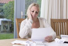A woman with financial problems. (Stock photo)