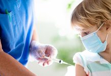 A young boy receiving a vaccination. (Stock photo)