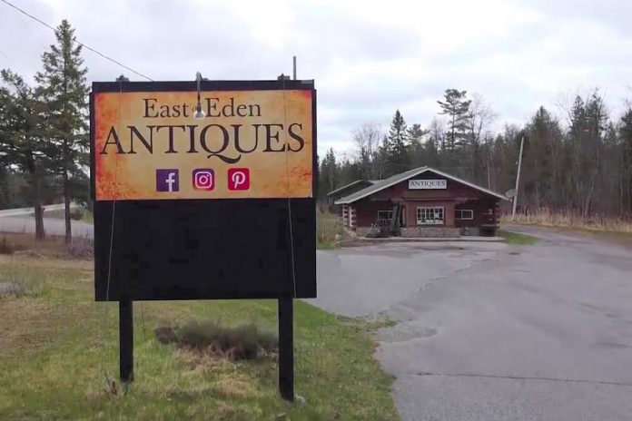 East of Eden Antiques has sold its property and buildings, located on Highway 28 at Woodview, to Kawartha Adventure Rentals. As part of the deal, Brenda Mahaffy's antique shop will continue to operate out of the white church on the property. (Screenshot from Facebook video by kawarthaNOW)