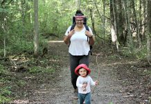 GreenUP program coordinator Sara Crouthers, pictured enjoying a hike with her son at Sibbald Point Provincial Park, explains that the traumatic injustices faced by the world's Black people, Indigenous people, and people of colour also extend to the environmental movement. (Photo courtesy of Sara Crouthers)