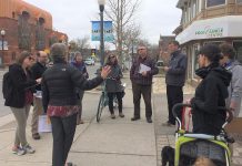 It's better for students' health and the environment if they have active transportation options when they head back for in-person learning in the fall. Pictured are parents, guardians, teachers, school staff, and other community members in May 2019 during a walkabout of the Immaculate Conception School area in Peterborough's East City, an important opportunity to hear directly from community experts about active school travel challenges and opportunities. (Photo courtesy of GreenUP)