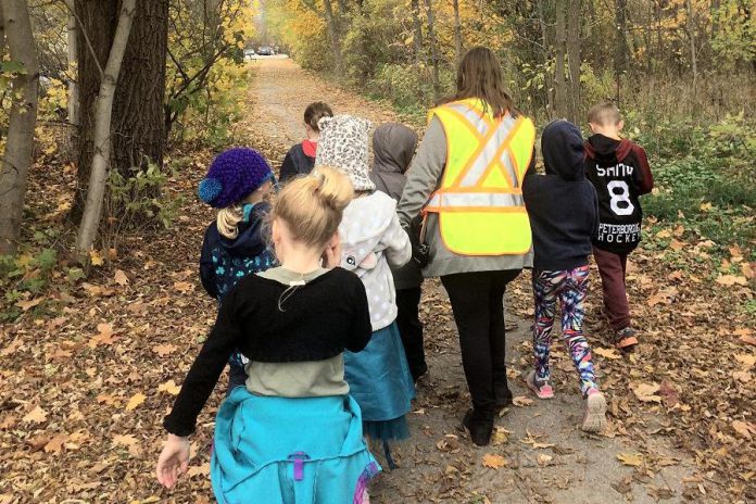 Students from the former King George Public School enjoy a walk on a local trail in October 2019. King George and Armour Heights public schools are being replaced by the new Kaawaate East City School, scheduled to open September 2021.  (Photo courtesy of GreenUP)