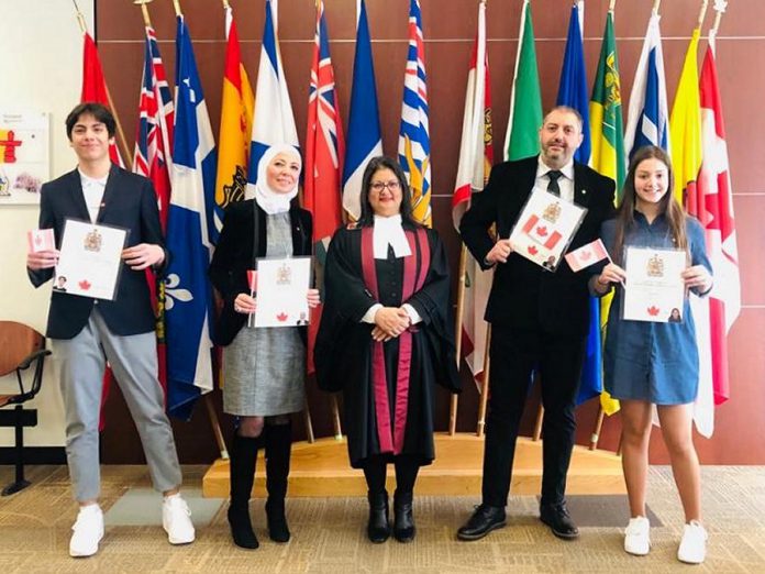 Imad Mahfouz (second from right) came to Canada in 2015 with his family (son Abdullah, wife Nerveen, and daughter Zeina) to escape the war in Syria and settled in Peterborough. The family of four obtained their Canadian citizenship in 2020. Imad, who loves cooking, was a restaurateur in Syria and plans to open a restaurant in his new home community of Peterborough. (Photo courtesy of the Mahfouz family)