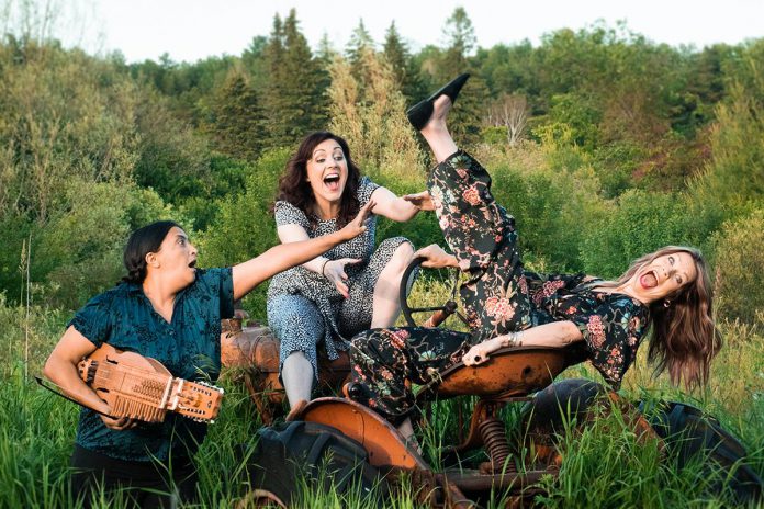 Musician Saskia Tomkins and The Verandah Society co-creators Megan Murphy and Kate Suhr ham it up in a promotional photo for "The Verandah Society in Residence at 4th Line Theatre", which runs for 10 performances from August 17 to 28 at the Winslow Farm in Millbrook. Tickets for the performances go on sale on July 5, 2021. (Photo: Tristan Peirce Photography)