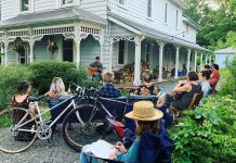 As a pandemic project, Peterborough housemates Tiphaine Lenaik and Rosemary MacAdam launched a series of porch concerts at their Bonaccord Street home last summer. Tiphaine organizes the concerts, while homeowner Rosemary emcees. The series, called 'Waiting for the right porch', is returning this summer with a porch concert every two weeks. Pictured is the July 23, 2021 concert, which featured LA Alfonso, Jake Bartoli, River Jensen, and Kalen Davidson. (Photo courtesy of Tiphaine Lenaik)