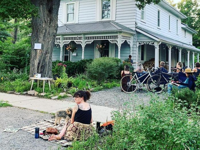 Last summer, 'Waiting for the right porch' was permitted to have 25 physically distanced audience members seated on the property, with others asked to stay by the sidewalk. Although capacity limits have increased in step three of Ontario's reopening plan, hosts Rosemary and Tiphaine will continue to limit audience size.  (Photo courtesy of Tiphaine Lenaik)