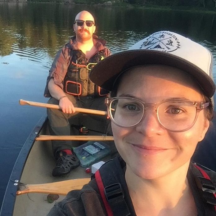 In addition to kayaking, Christine Hoogkamer loves yoga, crocheting, hiking, and camping. Hoogkamer and her partner Gregory are avid campers. Pictured are Christine and Gregory on a back country portage camping trip in August 2020. (Photo courtesy of Christine Hoogkamer)