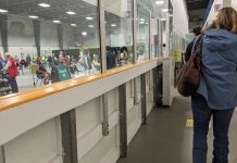 Peterborough-area residents stand in line waiting for a dose of COVID-19 vaccine at the Evinrude Centre on July 8, 2021. (Photo: Bruce Head / kawarthaNOW)