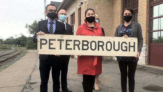 On July 8, 2021, Federal Transport Minister Omar Alghabra (left) was joined by Peterborough Chamber of Commerce president and CEO Stuart Harrison, Peterborough-Kawartha MP Maryam Monsef, VIA Rail president and CEO Cynthia Garneau (partially obscured), and Peterborough Mayor Diane Therrien to announce the start of the procurement process that will lead to passenger rail service returning to Peterborough. (Photo: Paul Rellinger / kawarthaNOW)