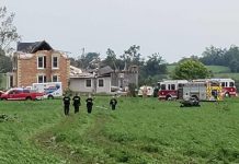 This farm house on Royal Oak Road near Manilla was hit by an apparent tornado on July 15, 2021. Carey Stacey and her son Owen were in the basement helping a cocker spaniel give birth to puppies when the house collapsed, trapping the two in the basement. (OPP-supplied photo)