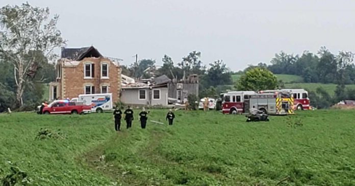 This farm house on Royal Oak Road near Manilla was hit by an apparent tornado on July 15, 2021. Carey Stacey and her son Owen were in the basement helping a cocker spaniel give birth to puppies when the house collapsed, trapping the two in the basement. (OPP-supplied photo)