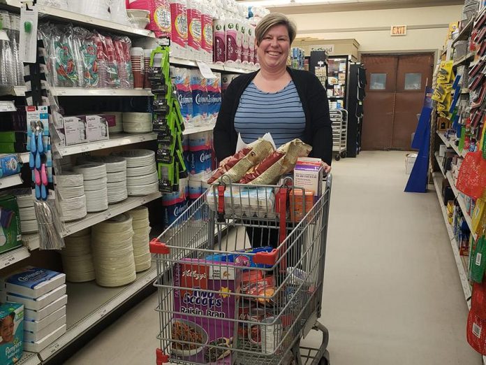 "There's a big hole in the heart of our town right now." North Kawartha Township Mayor Carolyn Amyotte helping to fill customer orders during the pandemic in April 2020 at the former Sayers Foods grocery store in Apsley. (Photo: Sayers Foods / Facebook)