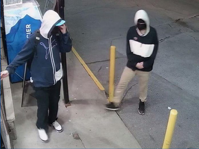 Peterborough police are seeking these two suspects after an armed robbery at a convenience store in the George Street North and Parkhill Road area on July 9, 2021. (Police-supplied photo)