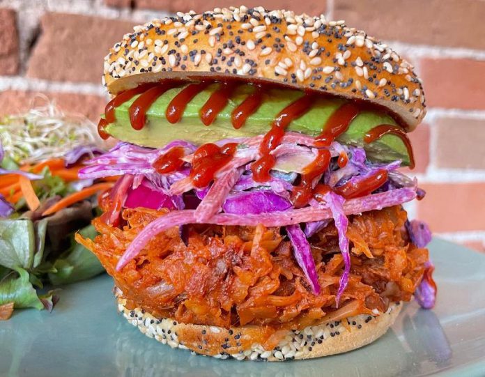 The Food Forest is known for its creative vegan fare, such as this BBQ pulled-jackfruit sandwich that contains no meat, dairy, eggs, or gluten. The restaurant serves fresh organic juices and smoothies, gourmet salads, soups, delicious desserts, cooked and raw entrées, and more. (Photo: The Food Forest / Facebook)