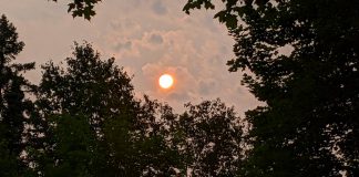 Smoke returning to Kawarthas region later on Friday and possibly into weekend The late afternoon sun appears pinkish orange on July 19, 2021 due to smoke from active forest fires in northwestern Ontario moving over southern Ontario. (Photo: Bruce Head / kawarthaNOW)