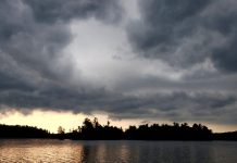 A thunderstorm passes over a lake in North Kawartha Township on July 5, 2021. (Photo: Jeannine Taylor / kawarthaNOW)