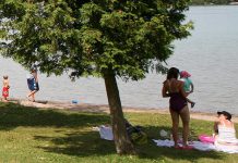 Families at a Peterborough-area beach. (Photo: Peterborough Public Health)