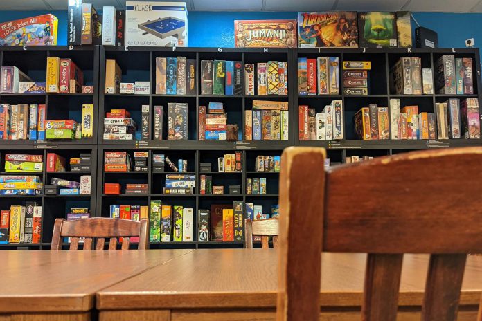 The Boardwalk Board Game Lounge in downtown Peterborough has over 550 games to play and also offers food and drink. Co-owners and brothers Connor and Dylan Reinhart opened the business after visiting board game lounges in other cities. Connor, who is a chef, and Dylan, who is an educator, grew up in Peterborough playing board games with their family. (Photo courtesy Boardwalk Board Game Lounge)