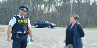 North Kawartha Mayor Carolyn Amyotte speaks with Peterborough County OPP staff sergeant Chris Galeazza in May 2021 about the three stretches of Highway 28 in North Kawartha that have the most collisions, the reasons why, and the intention to have the three stretches designated as community safety zones where speeding fines are doubled. (kawarthaNOW screenshot of Facebook video)