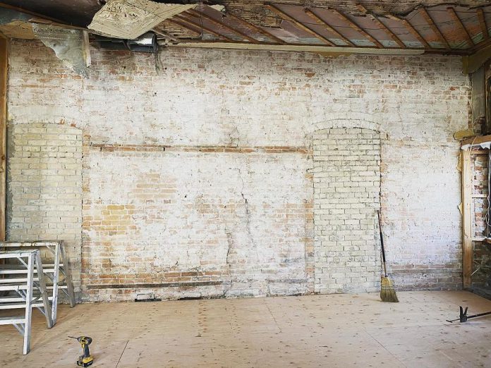 Renovations at The Cow & Sow Eatery have unearthed some of the building's past, including this brick wall that was once part of a historic hotel. (Photo: The Cow & Sow Eatery)