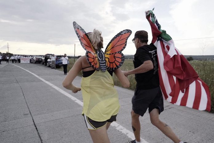 Monarch Ultra co-founder Carlotta James and race director Clay Williams run together during the 2019 Monarch Ultra Relay Run, which ran the distance of the monarch butterfly's 4,300-kilometre migratory route from Canada to Mexico over the span of seven weeks. A marathon runner and a pollinator advocate, James conceptualized the relay run in 2016 while running and feeling inspired to do good for the earth. This year's Monarch Ultra, which takes place in southern Ontario from September 19 to October 9, is also raising funds for Camp Kawartha's environmental programs for youth. (Photo: Rodney Fuentes)