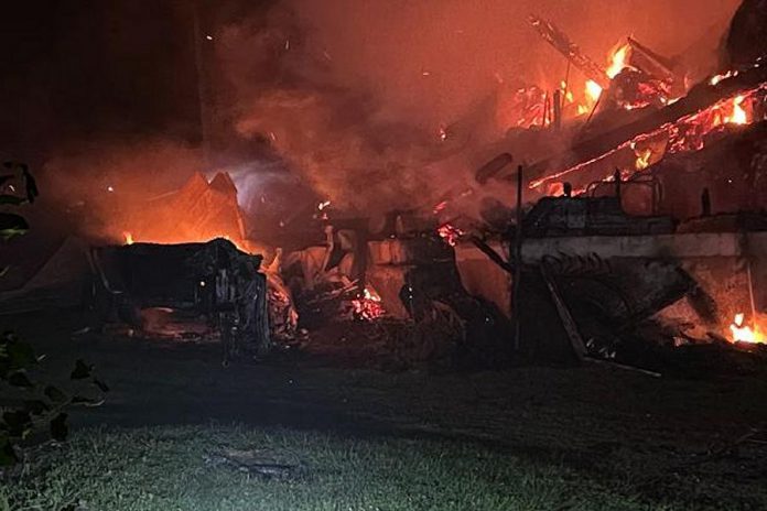 The Alton's barn was engulfed in flames minutes after it was struck by lightning. While they were able to save their horses and alpacas, the Alton's chickens perished in the fire.  (Photo courtesy of Tiffany Alton-Froggatt)